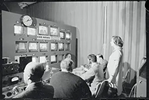 Mrs. Nelson Rockefeller Observing Husband on Television
