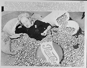 Pepsico Prints: Mrs. Querin Laying in 80, 000 Bottle Caps