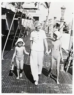 Mrs. Walter Winchell with Daughters at Beach