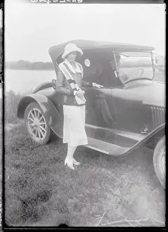 Mrs. William Fleitman Posing with Car