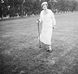 Mrs. William Randolph Hearst Holding a Golf Club
