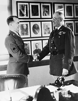 MSGT Louis C. Mosher and MG Malin Craig Shaking Hands