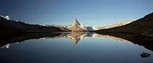 Mountain Lake Prints: Mt Matterhorn with reflections in Stellisee Lake in the first morning light