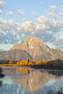 Images Dated 29th September 2015: Mt. Moran reflecting in Snake River in autumn, Grand Teton National Park, Wyoming, USA