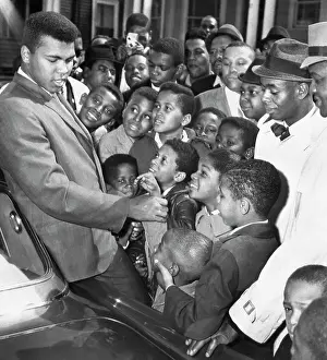 Muhammad Ali With Boys in Boston