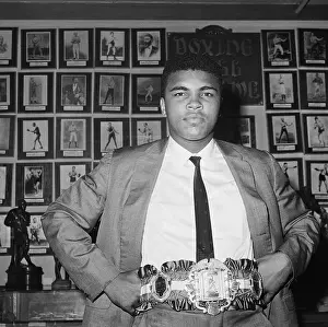 Achievement Prints: Muhammad Ali Displaying Title