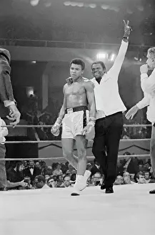 Muhammad Ali with His Handler After Winning Bout