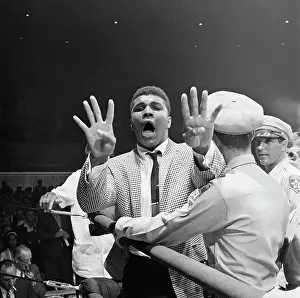 Muhammad Ali Holding Up Eight Fingers