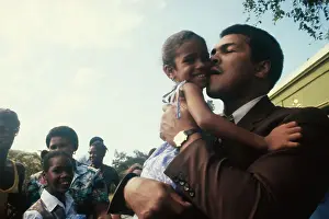 Muhammad Ali Kissing Virgin Islands Youngster