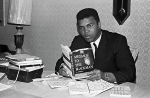 Muhammad Ali Reading a Book