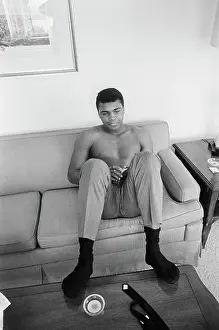 Muhammad Ali Seated on Couch