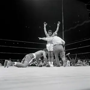 Muhammad Ali in Victory Pose over Zora Folley