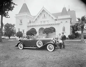 Casual Collection: Multigeneration family in car and outside car in front of house