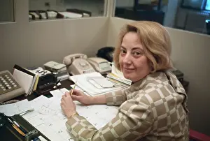 Muriel Siebert Working at her Desk