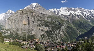 Images Dated 20th July 2016: Murren village above Lauterbrunnen Valley with Monch mountain in background, Swiss Alps, Switzerland
