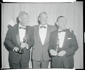Musical Greats Holding Their Oscars for Camera