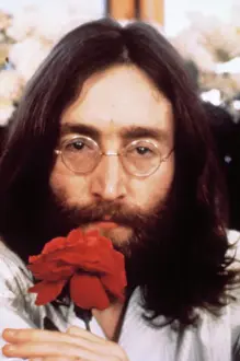 Musician John Lennon With Rose