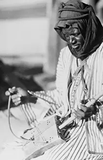 Stringed Instrument Prints: Musician Playing String Instrument