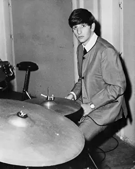 Musician Ringo Starr Playing Drums