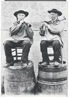 Musicians Playing atop Barrels