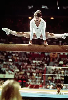 Nadia Comaneci Making Difficult Balance Beam Stretch