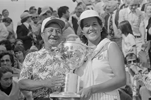 Nancy Lopez and Father Holding Trophy