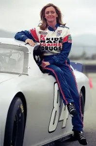Prints of NASCAR Race Car Driver Shawna Robinson during break while test driving car at Ontario Motor Speedway, April 3, 2001 in Ontario, California. (Photo by Bob Riha, Jr./Getty Images) Chasing Speed: Motorsport in Motion: NASCAR Race Car Driver Shawna Robinson