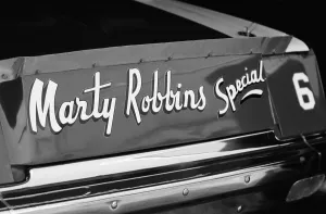 Prints of DAYTONA BEACH, FLORIDA - JULY 1980: The Marty Robbins Special, a racecar driven by country and western singer Marty Robbins Chasing Speed: Motorsport in Motion: NASCAR races and drivers