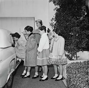 Prints of American actress Natalie Wood (1938 - 1981) letting her sister Lana Wood and her friends entering a car, US, 6th January 1956. (Photo by Graphic House/Archive Photos/Getty Images) Grace, Glamour & Timeless Elegance: Natalie Wood with Lana Wood and friends