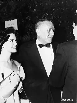 Prints of American actor Natalie Wood (1938- 1981) and film producer and agent Leland Hayward (1902- 1971) stand together at a March of Dimes benefit performance of The Spirit Of St Where New York’s brightest moments take center stage: Natalie Wood & Leland Hayward At Benefit