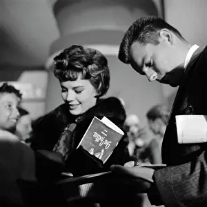 Prints of American actress Natalie Wood wearing a black fur coat, and her husband, American actor Robert Wagner, attend an Ice Follies performance in Los Angeles, California, 1959 Grace, Glamour & Timeless Elegance: Natalie Wood & Robert Wagner