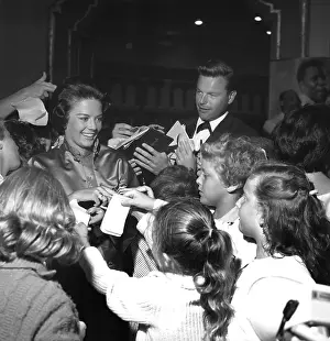 Prints of LOS ANGELES - 1959: Actors Natalie Wood and Robert Wagner sign autographs for fans in 1959 in Los Angeles, California. (Photo by Earl Leaf/ Michael Ochs Archives/Getty Images) Grace, Glamour & Timeless Elegance: Natalie Wood And Robert Wagner