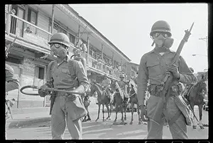 National Guardsmen Patrolling a Street