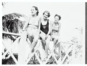 National Swimmers Posing on Railing