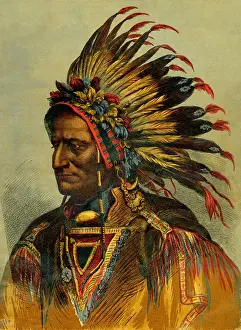Native American chief wearing head-dress