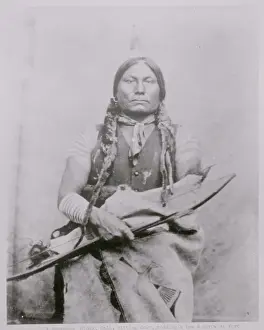 Native American Holding Bow and Arrow