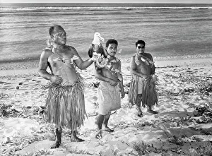 Grass Skirt Prints: Native People Standing on Shoreline with Bird