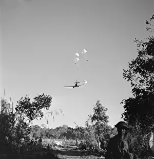 Natives Pleading for Food After American Transport