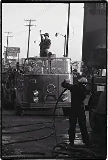 Fire Engine Prints: Nat'L Guardsman Standing On Fire Truck