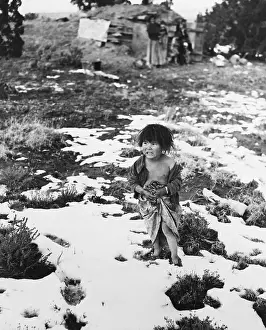 Crying Prints: Navajo Toddler Standing on Snowy Ground