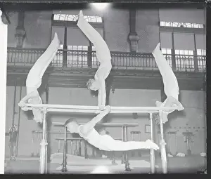 Prints of (Original Caption). Maryland: Good Muscle Building. Four of the star gymnasts of the Navy gym team at the United States Naval Academy, Annapolis, Md Flips of History: Naval Academy Students Performing Gymnastic Stunts