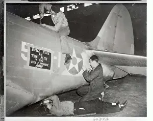 Norfolk Prints: Naval Employee Working on Airplane