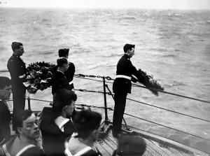 Prints of 19th November 1925: A Naval funeral service over the grave of those killed in the submarine M1. Wreaths are being thrown over the stern of the HMS Maidstone Topical Press Agency Prints: Naval Funeral