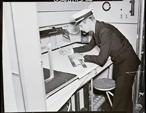 Route Prints: Naval Officer Charting Flight Route