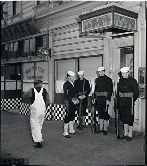 Protecting Prints: Navy Detachment Outside Restaurant