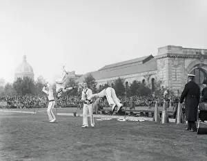 Navy Football Team Cheerleaders in Action