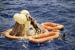 Navy Frogman Climbing onto the Lunar Module