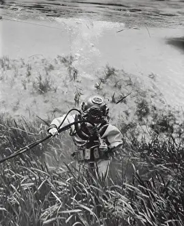 Navy Man in Diving Gear While Working Underwater