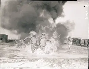 Navy Men Testing Fire-Proof Suits