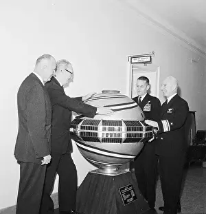 Navy Space Experts with Satellite Model